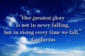 Our greatest glory is not in never falling, but in rising every time we fall. Inspirational quote background with sky and clouds. Royalty Free Stock Photo